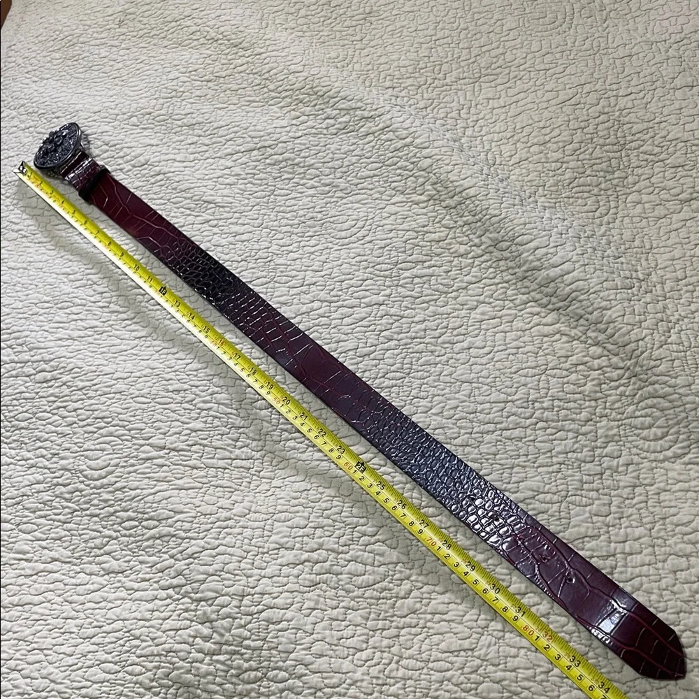 WHBM statement , burgundy, snake skin patent belt with jewel buckle